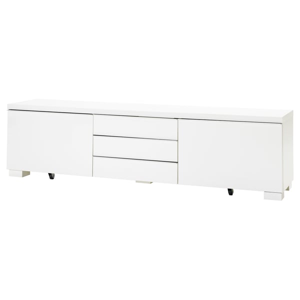 White bestå tv stand, modern design with drawers and cabinets for storage.