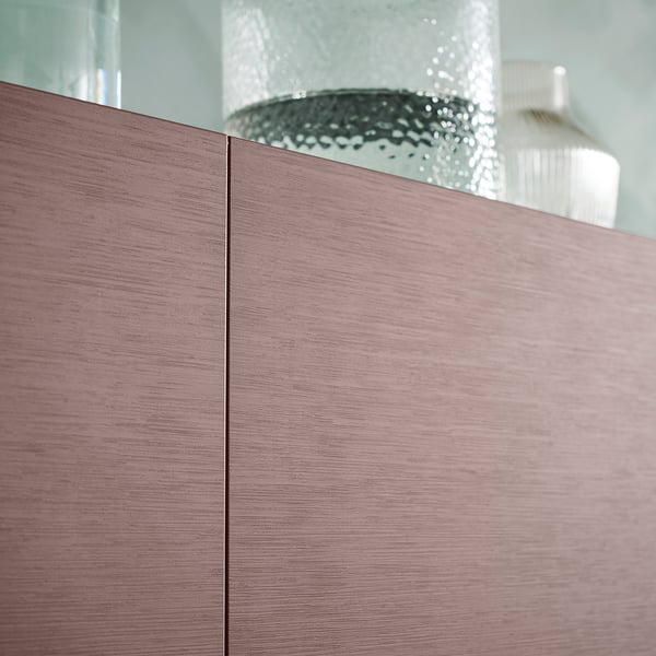 Modern brown wooden cabinet with mirrored top, displaying modern decor.