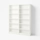 A BILLY white bookshelf with six empty shelves, all made of particleboard and providing adjustable storage space.