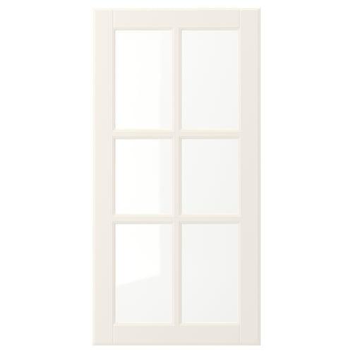 A white BODBYN door with a classic design and bevelled panels for a traditional look. It has a smooth, lacquered finish and tempered glass panels.