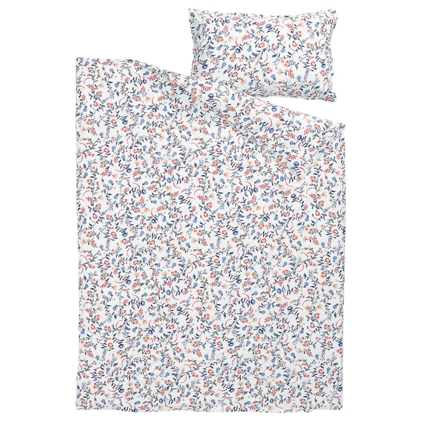 A BRUDKRUSBÄR duvet set in a floral white design with blue and orange patterns, made from 100% organic cotton.
