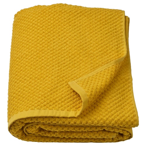 A folded yellow GULVIAL towel made of 100% cotton, rectangular with a textured surface.