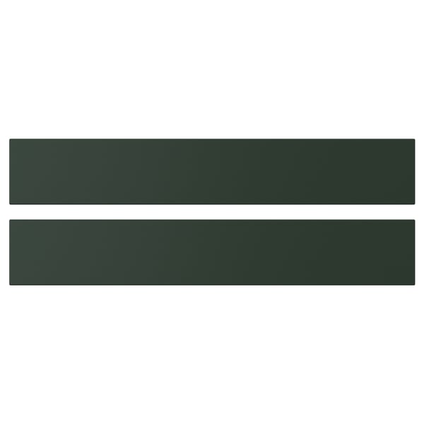 Two green rectangular shelves, part of IKEAs HAVSTORP series, with a smooth surface and straight lines, perfect for modern home decor.