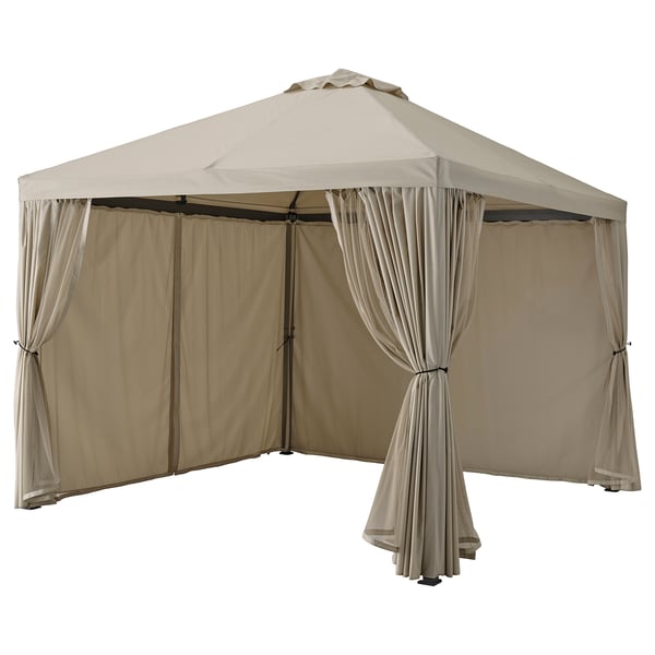 HIMMELSÖ beige gazebo; four posts, square, tent-style design with draped curtains.