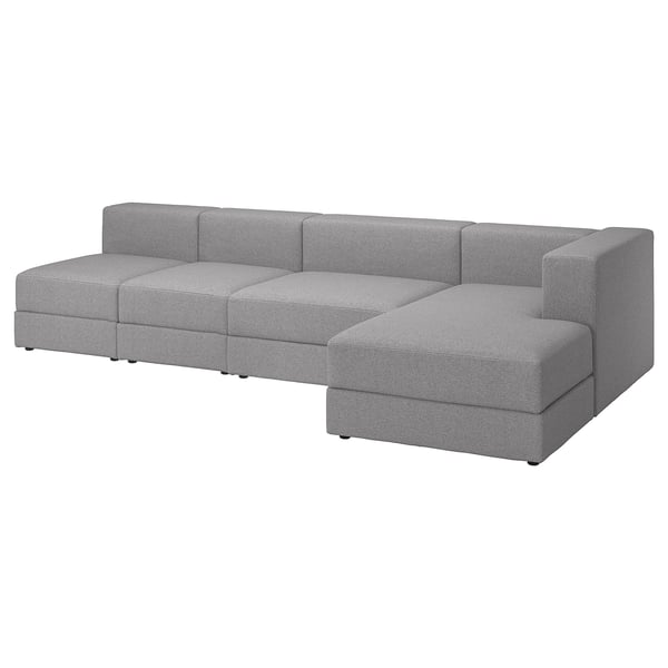 A grey JÄTTEBO modular sofa with a chaise longue, featuring a soft, modern design with clean lines and comfortable cushions.