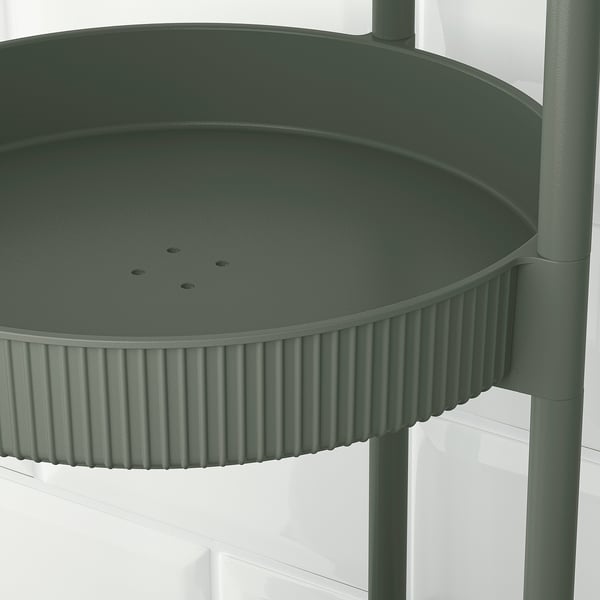 Green, round, multi-tiered trolley with detailed design, showcasing high-quality materials and craftsmanship.
