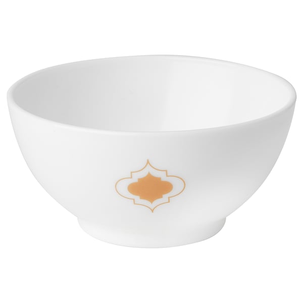 White round bowl with gold geometric pattern, glassware.
