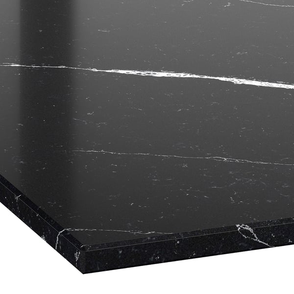 Polished black quartz countertop with white veining, smooth and sleek texture.