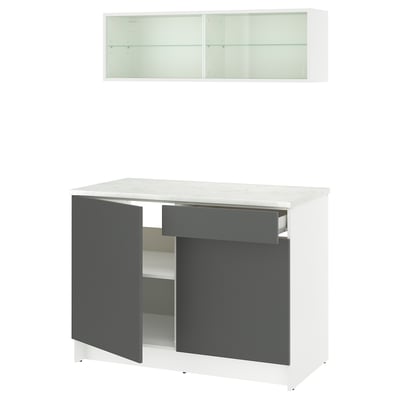 Modern white kitchen unit with grey doors and marble countertop. Includes wall cabinet with sliding glass doors.