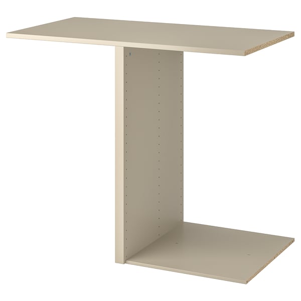 An ikea KOMPLEMENT wardrobe divider in white. It has a flat top and bottom, connected by a vertical panel with holes for hanging items.