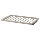 KOMPLEMENT trouser hanger in beige, modern design with slatted structure, sturdy steel frame, smooth surface for easy access.