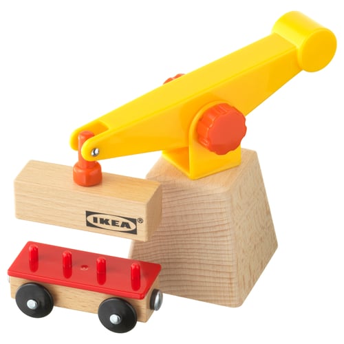 IKEA LILLABO toy crane, yellow and orange plastic, wooden base, small red wagon below.