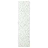 Linneberg cream-colored storage door with green floral design.