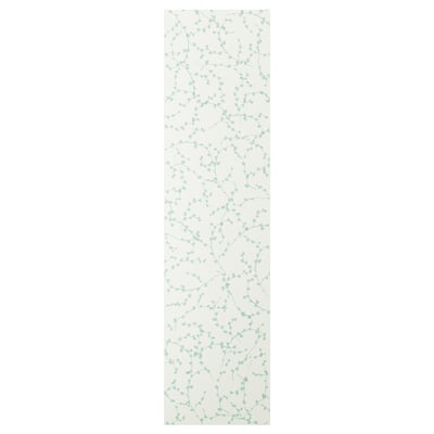 Linneberg cream-colored storage door with green floral design.