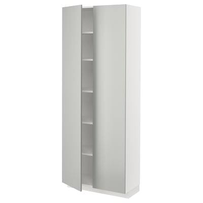 A modern, white ikea METOD kitchen cabinet with light grey doors, sleek design, and clean lines.