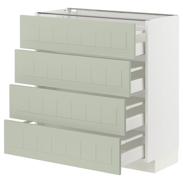 Modern kitchen unit with four green drawers by ikea METOD.