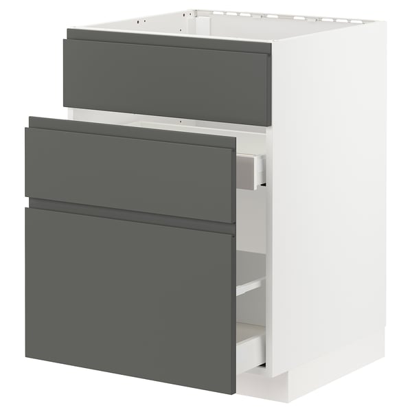 Modern kitchen unit, white with grey drawers, sleek design, integrated handles.
