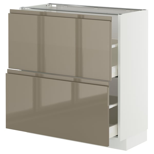 Modern kitchen cabinet with high-gloss dark grey-brown drawers and sleek handles.
