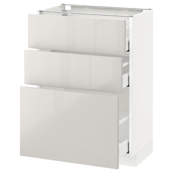 Modern white storage unit with three open pull-out drawers, sleek design.