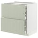A light green METOD kitchen cabinet with three drawers in a modern design.
