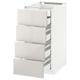 White METOD kitchen unit with four grey high-gloss drawers, sleek and modern design.