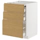 White METOD kitchen cabinet with oak-effect drawers.
