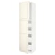 A white METOD kitchen cabinet with two doors and adjustable shelves. It has a traditional design with bevelled edges and a sleek, off-white finish.