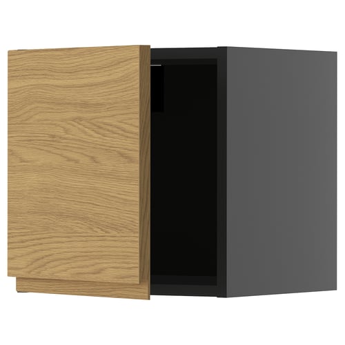 Wooden cabinet with grey box, open door, oak finish.