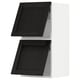 Black stained wooden cabinet doors with bevelled edges.