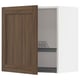 Open wooden cabinet: brown door, metal shelf, white interior.