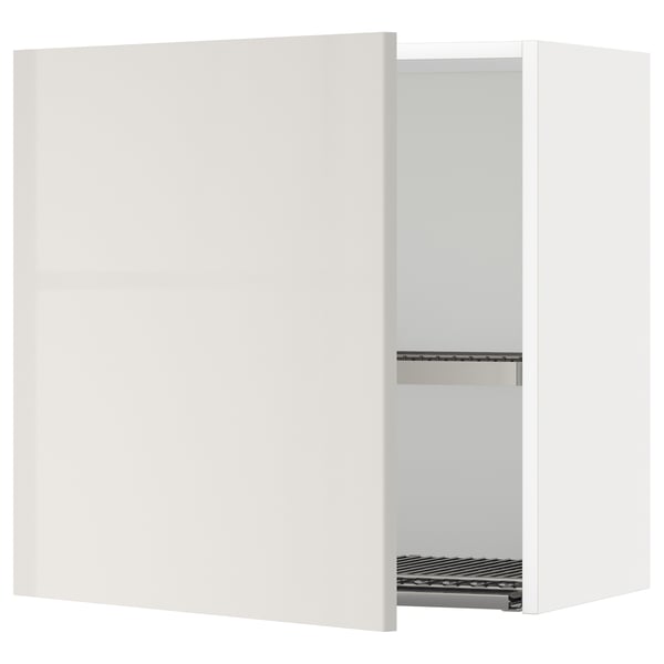 A white METOD kitchen wall cabinet with a high-gloss finish and a built-in dish drainer. The cabinet is rectangular in shape and has a modern design.