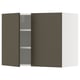 A dark brown ikea METOD kitchen wall cabinet with a beige interior and adjustable shelves.