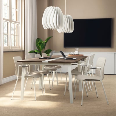 Minimalist conference table MITTZON with tv, plant.
