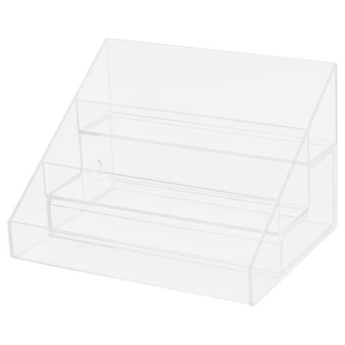 A clear acrylic nail polish storage stand with 24 compartments in 3 tiers, plus a drawer for tools.