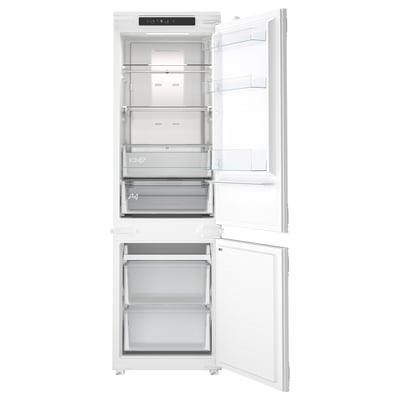 Open white refrigerator, showing empty fridge and freezer sections, clear shelves and drawers, black control panel atop.