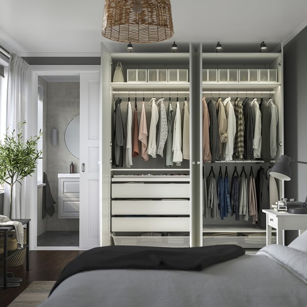 Modern bedroom with built-in wardrobe and efficient storage solutions.
