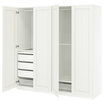 White PAX wardrobe with open doors, shelves, and drawers.