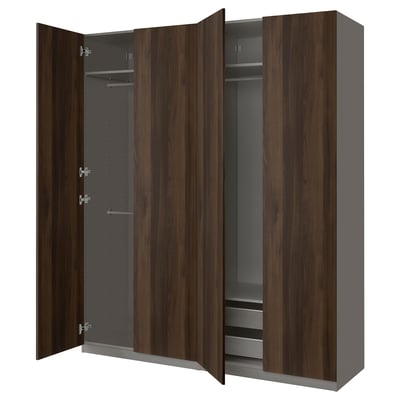 Modern wardrobe named PAX with dark wooden finish, featuring silver hinges, adjustable feet, and metal mesh shelves.