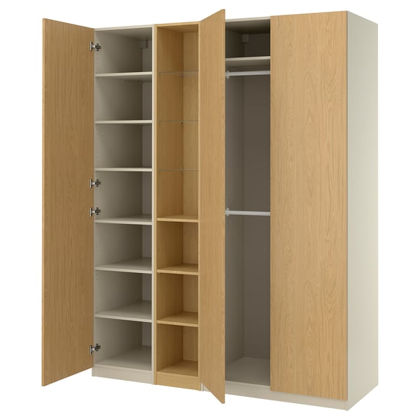 Wooden PAX wardrobe shown open, light oak, rectangular, four large doors, multiple shelves and hanging space.