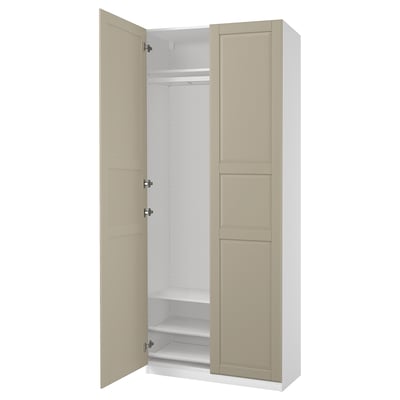 PAX wardrobe: tall, beige, minimalist, beige doors, wooden materials, narrow frame, soft-closing hinges.