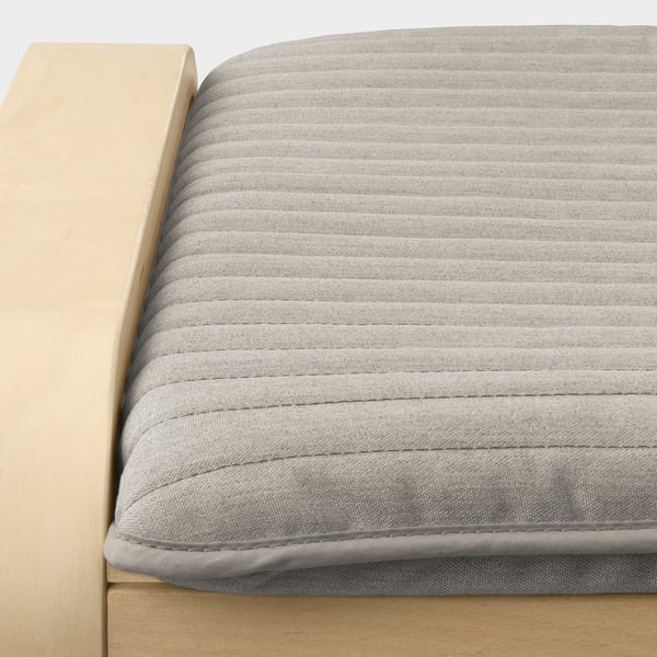 Modern footstool, light wood, grey cushion.