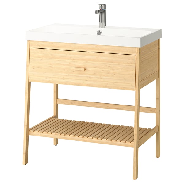 Modern light brown wooden bathroom vanity with single white sink and silver tap. Includes bottom shelf and single drawer.
