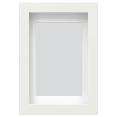 A white RÖDALM picture frame, rectangular and modern, with a removable front protection panel.