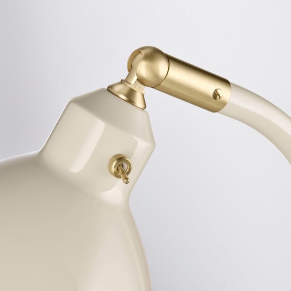 Modern desk lamp, gold & white, toggle switch, adjustable shade.