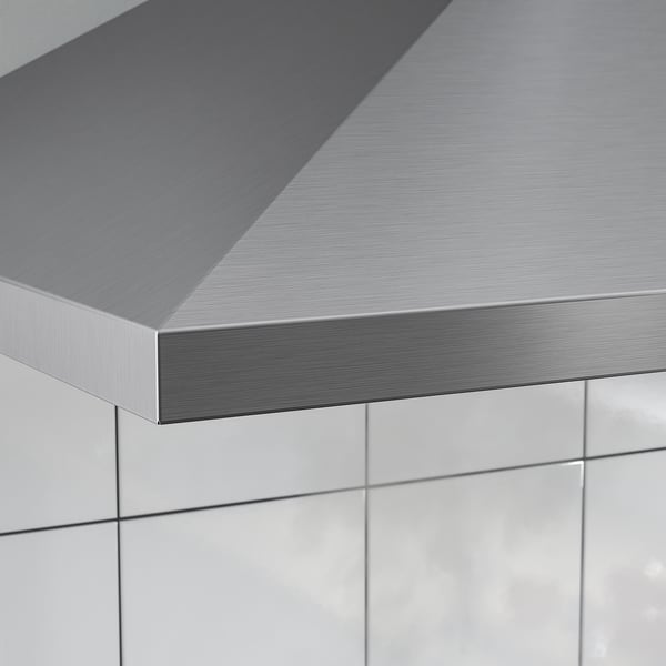Stainless steel kitchen hood close-up, sleek design, modern finish.