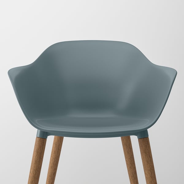 A modern chair with a sleek, grey-blue seat shell and wooden legs, showcasing high-quality, ergonomic design.