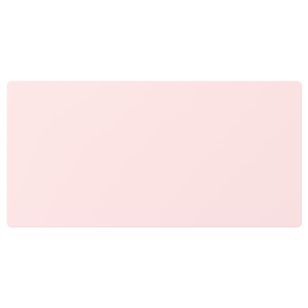 Image shows a light pink rectangular object, shaped like a drawer, representing SMÅSTAD storage furniture.