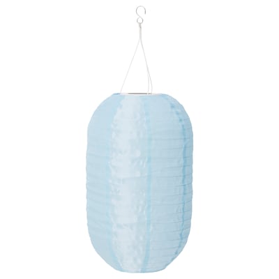 Blue SOLVINDEN solar lantern, made from recycled materials, glows in dark after sun charging.