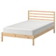Natural wood TARVA bed frame with light grey mattress. Simple, scandinavian design.