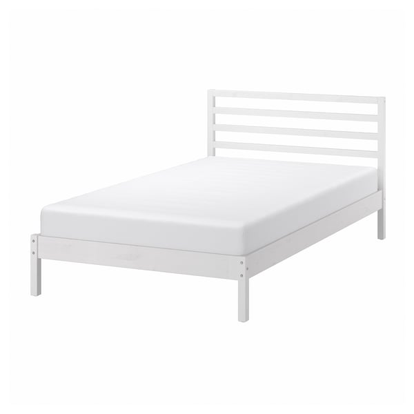 White TARVA bed with simple, clean design; wooden slats and headboard.